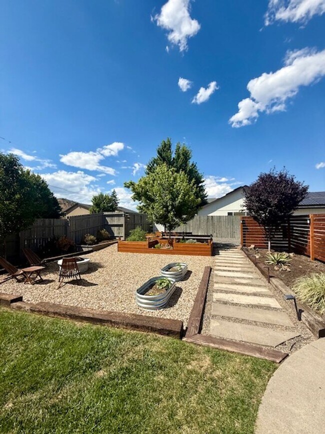 Building Photo - Serene Remodeled 4 Bedroom on Large Lot w/...