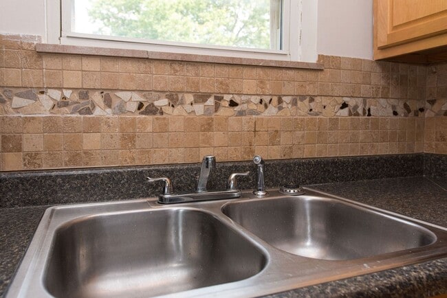 Building Photo - COVEDALE- 3 bedroom 1.5 bath Tudor with up...
