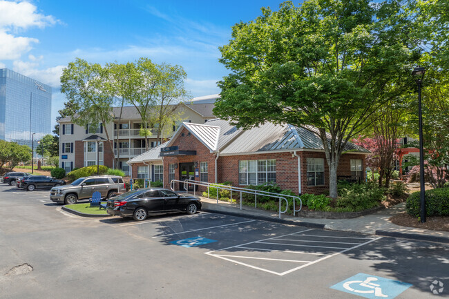 Leasing Office and Pathway to Courtyard - Flats on Maple Street