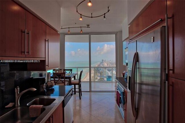 Building Photo - 6365 Collins Ave