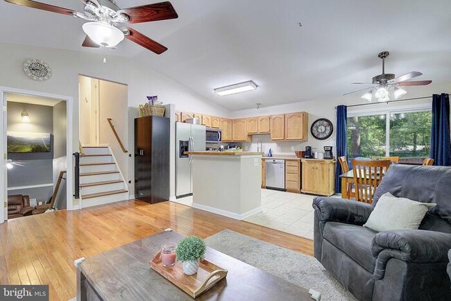 Building Photo - Welcome to this delightful split-level hom...