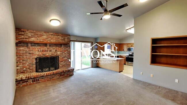 Building Photo - Enjoy this 3-bedroom home featuring a fully equipped kitchen, a two-car attached garage, and a fe...