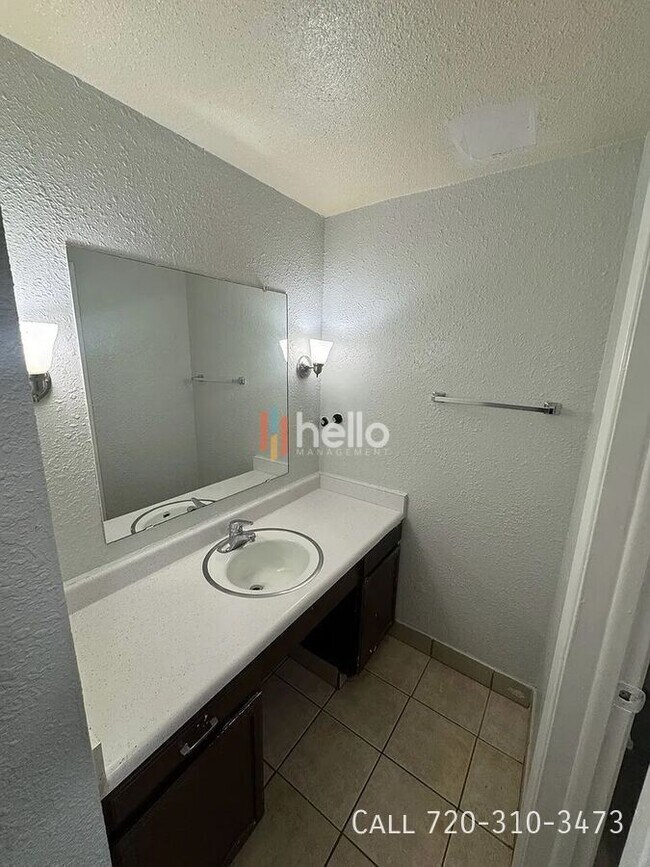 Building Photo - 9504 East 17th-102