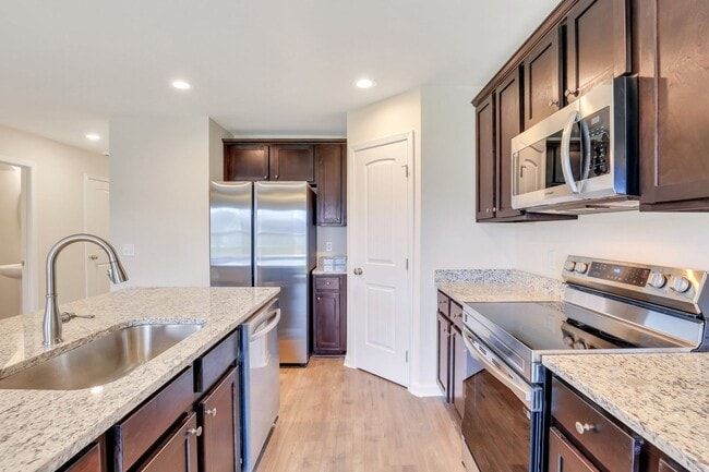 Building Photo - New Construction - 3 Bed 2 1/2 Bath, attached garage townhome