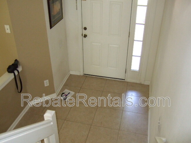 Building Photo - 7528 Scarlet Ibis Ln