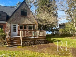 Building Photo - Waterfront Tudor | Private, Vintage Charm with Casita