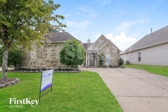 Building Photo - 8595 Shady Elm Dr