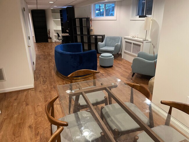 view from kitchen/dining area to living and den areas - 1869 Park Rd NW