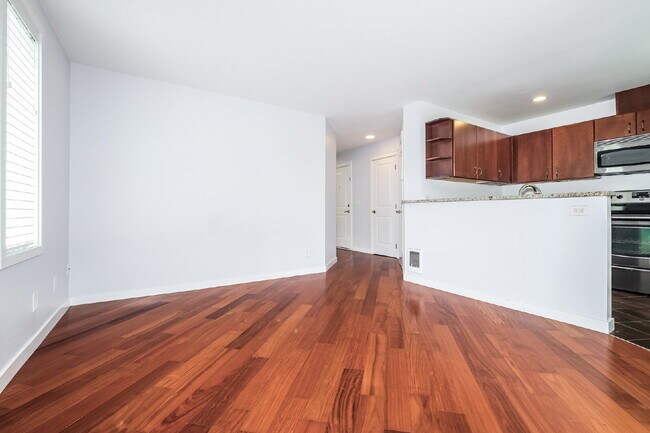 Building Photo - **Updated 2-Bedroom Condo with Secure Parking**