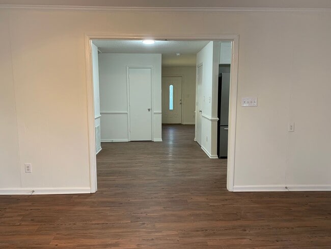 Building Photo - 3 bedroom & office -2 baths -2 car carport - washer/dryer hook ups - Den and formal living room- ...