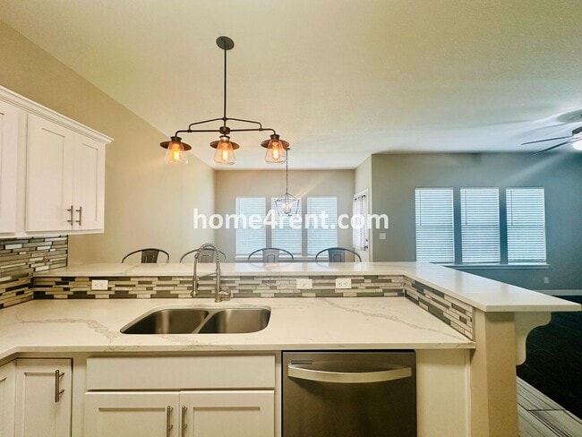 Building Photo - Ranch Style Home w/ Updated Kitchen, including SS Appliances and Granite Counters Plus a Large Un...