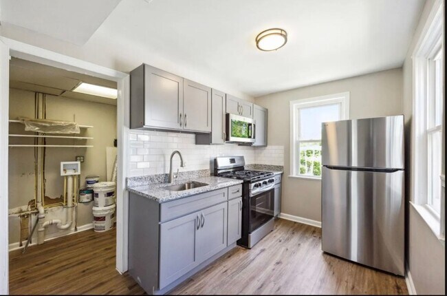 Building Photo - Fully Renovated Two-Bedroom Townhome In Du...