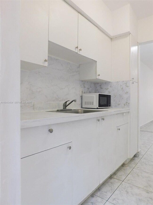 Building Photo - 7840 Harding Ave