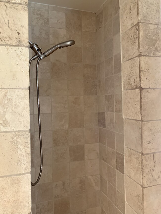 2nd Bathroom natural stone Shower - 100 S Doheny Dr