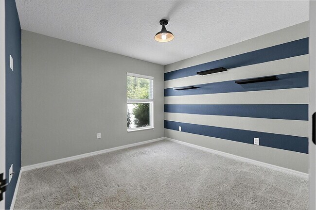 Building Photo - Modern 4-Bedroom, 3-Bath Home with Private In-Law Suite – Palm Coast, FL