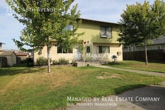 Building Photo - 311 E 46th Ave