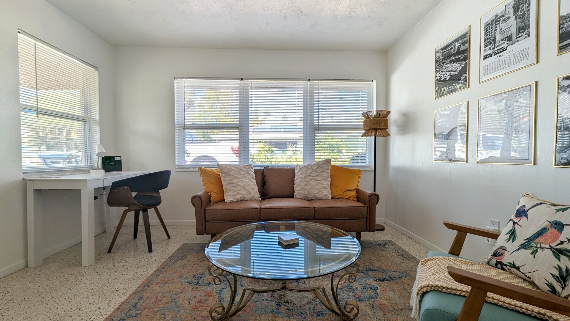 Workspace and desk within the living room - 2846 W Tamiami Cir