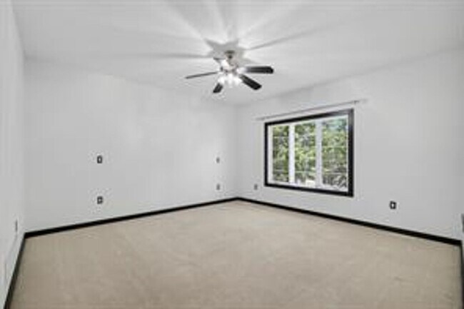 Building Photo - Spacious 5-Bed Walkout Home with Over 3,50...