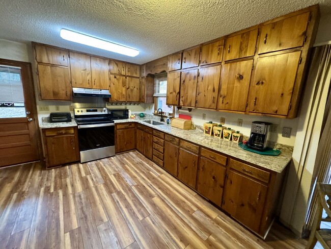 Building Photo - Lakefront Living! Furnished 3-Bed Home w/ ...