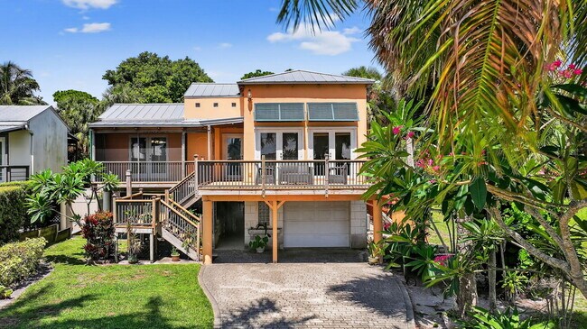 Building Photo - 1042 SE St Lucie Blvd