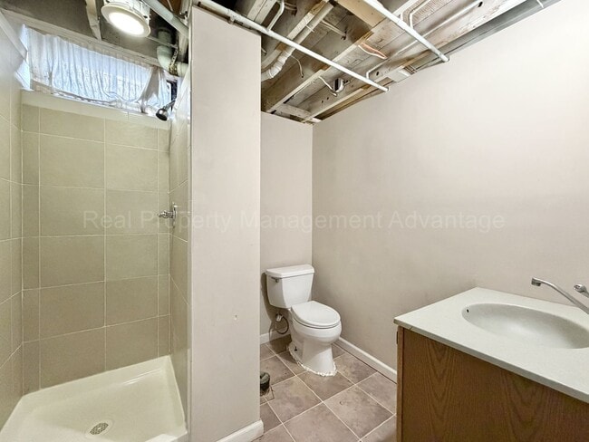 Building Photo - Solid Brick and Renovated with New Kitchen and Two Full Baths!