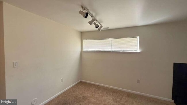 Building Photo - 8103 Greenspring Way
