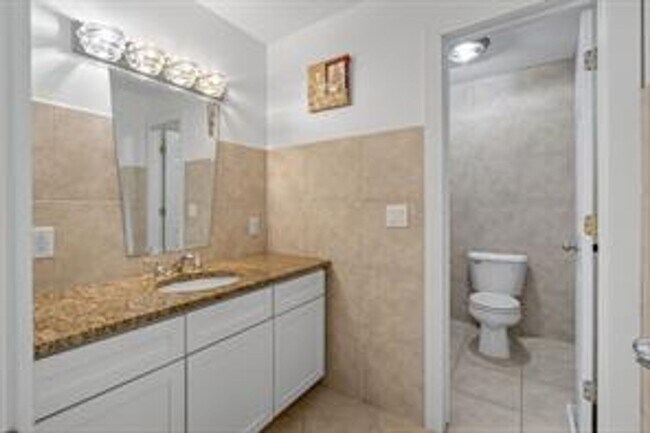 Building Photo - Spacious 5-Bed Walkout Home with Over 3,50...