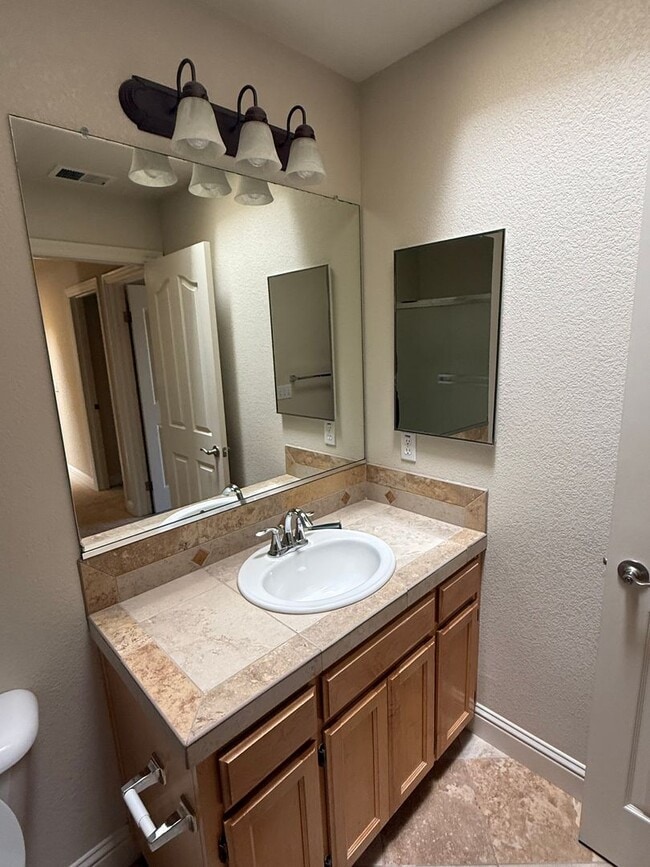 Building Photo - Spacious 3 - Bedroom / 2.5 Bath Condo in Desirable Town Green Village