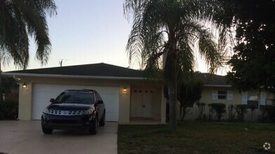 Building Photo - 4 bedroom 3 bath pool home w/ includes a g...