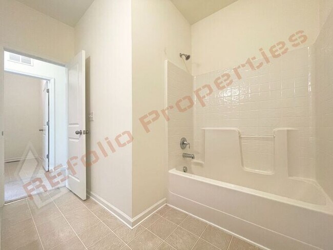 Building Photo - Beautiful 2 Story 3 Bedroom End Unit Townh...
