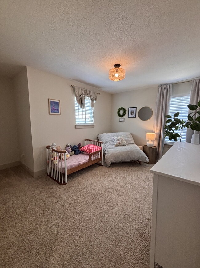 Building Photo - Need Space?  How about 5 bedrooms, 2.5 baths + an extra bonus area upstairs so that the kids can ...