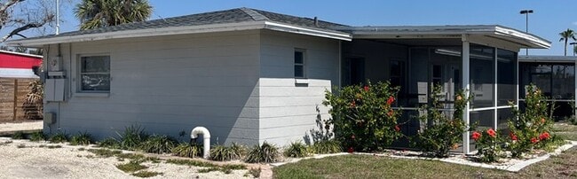 Building Photo - Lost in Paradise USA LLC