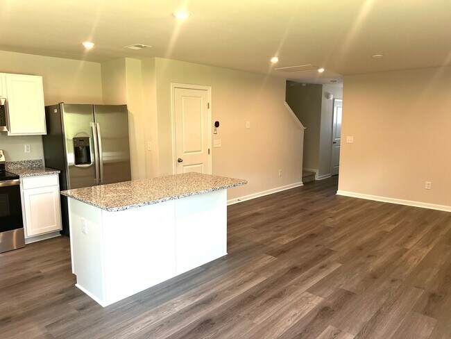 Building Photo - New Three-Bedroom, Two and one-half Bath T...