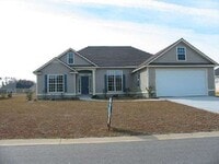 Building Photo - Spacious 3BR Home with Fireplace, Open Layout & Two-Car Garage