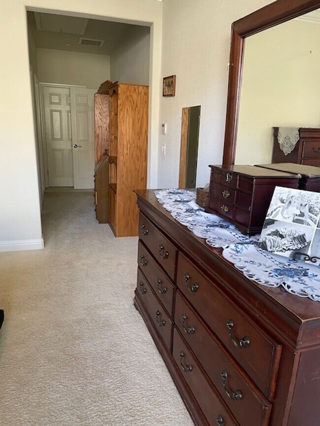 Building Photo - ****COMING SOON****Charming 2-Bed, 2-Bath Home in Del Webb at Woodbridge – 55+ Active Community!