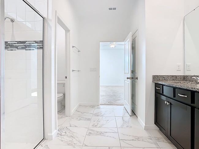 Building Photo - JUST REDUCED! PET FRIENDLY! Experience Com...