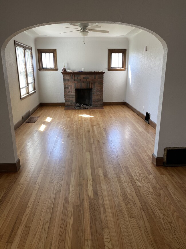 Fireplace will be converted to electric so it will look nicer than this and will be more convenient! - 128 Standish Dr