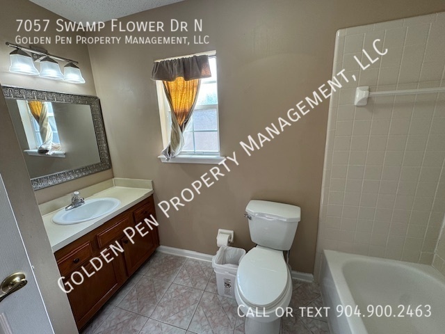 Building Photo - 7057 Swamp Flower Dr N