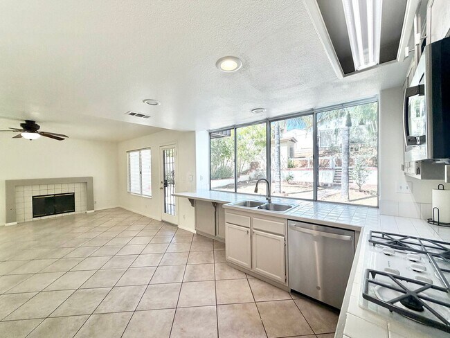 Building Photo - Spacious 5 Bedroom 3 Bathroom Home with Updated Paint, New Roof & Private Balcony