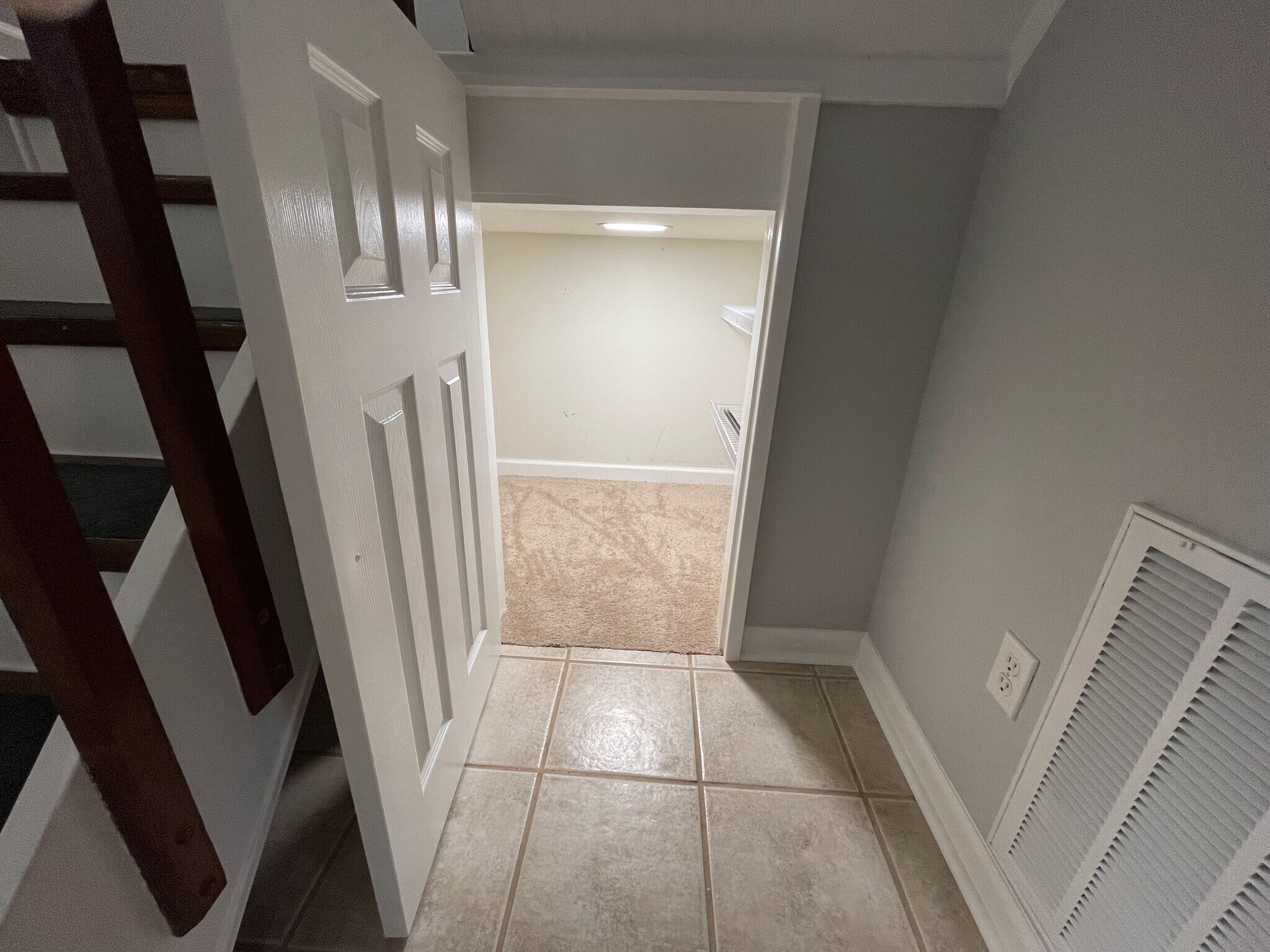 Under stairs landing storage with shelving and recessed lighting - 4204 Whistler Ct
