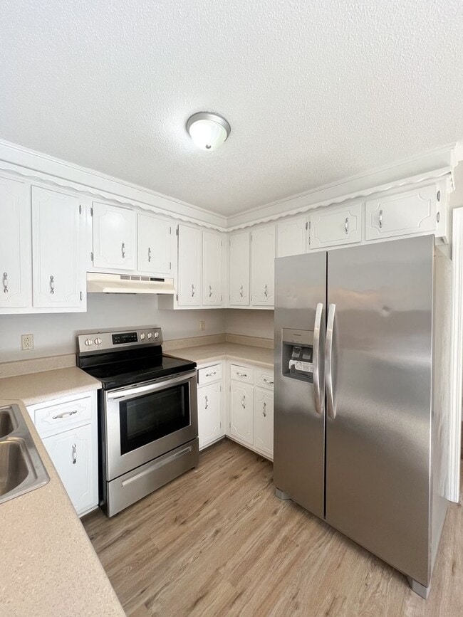 Building Photo - Move-In Specials Available! Large Deck and...