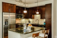 Building Photo - Luxury 1 Bed in Downtown – Look & Lease Sp...