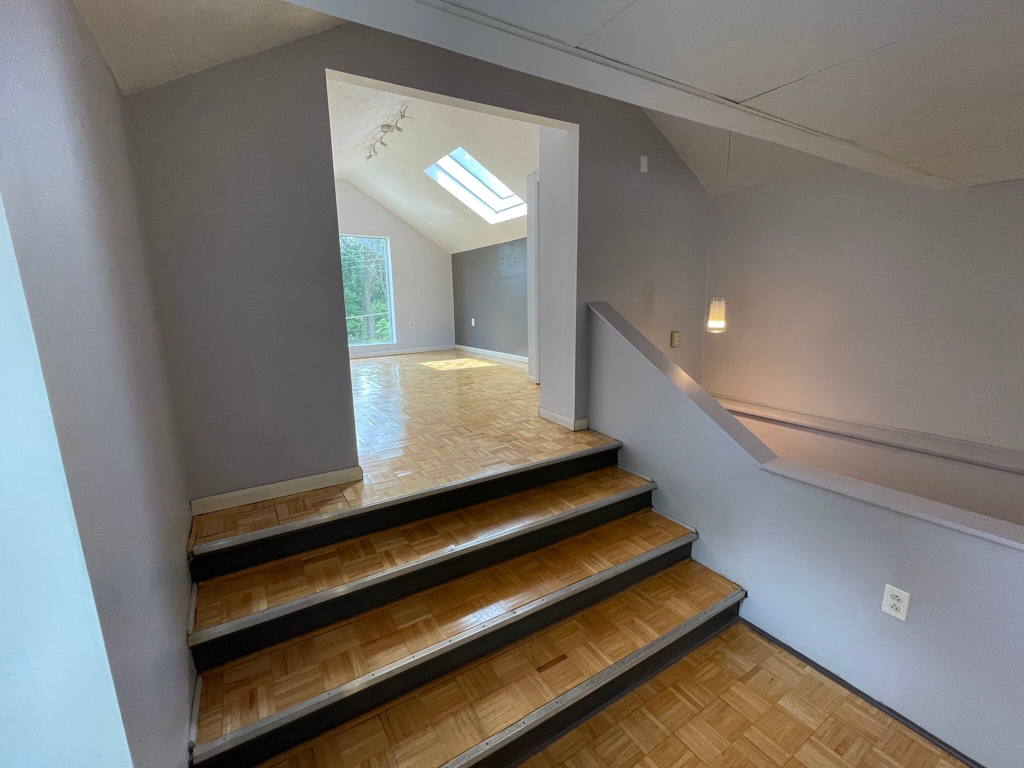 Steps leading to master suite with an additional closet - 227 Wilbert St