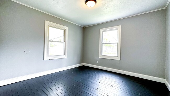 Building Photo - Spacious 3BR Corner-Lot Home w/ Full Basement & Large Yard