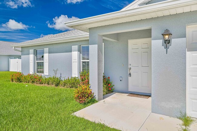 Building Photo - Spacious Three-Bedroom Home with Open Floor Plan, Large Yard