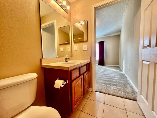 Building Photo - Gated Comfort Condo, Poolside Vibes: Your Next Home Awaits at Merrill Pines