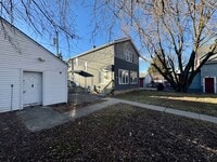 Building Photo - Beautiful 3 bedroom, 1 bath single family home with large fenced yard/ Garage /Central AC / Appli...