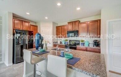 Building Photo - 7412 Rosy Periwinkle Ct