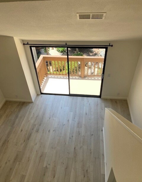 Building Photo - "Charming 1-Bedroom Retreat with Gleaming Hardwood Floors in Prime Irvine Location!"