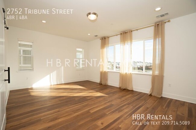 Building Photo - Spacious 4-Bed, 4-Bath Retreat on Tribune ...